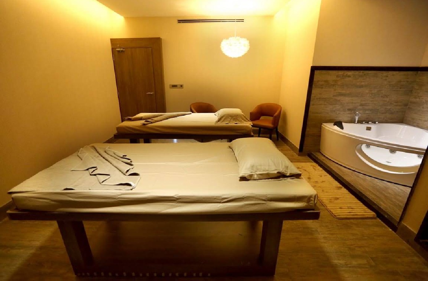 Twin massage therapy suite with private jacuzzi at Ghogi Spa HSR Layout, Bengaluru